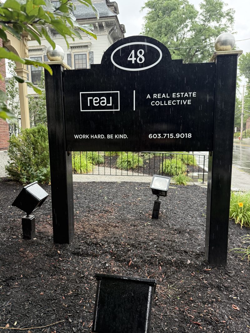 Real Estate Collective sign